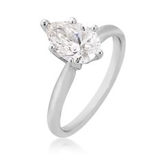 a white gold ring with a pear shaped diamond