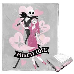 a blanket with a cartoon character holding a skull and the words misfit love on it