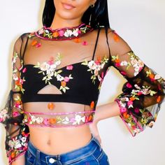 Long Sleeve Crop Top With Back Zipper And Embroidered Flowers Model Wearing Victoria Bandeau Underneath And Gina Denim Fitted Top With Multicolor Embroidery For Party, Fitted Floral Embroidered Crop Top For Festival, Fitted Floral Embroidery Crop Top For Festival, Fitted Multicolor Embroidered Tops For Party, Chic Fitted Crop Top With Floral Embroidery, Floral Embroidery Cropped Party Top, Spring Floral Embroidery Cropped Top, Embroidered Crop Top For Spring Party, Fitted Tops With Multicolor Embroidery For Fall