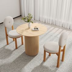 two chairs and a table in a room