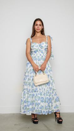 Indulge in the epitome of elegance with this delicate floral maxi dress adorned with a mesmerizing floral white design. Features: Maxi Floral Princess Seam Model is wearing a small 81380 A9-3 Feminine Floral Print Midi Dress For Casual Wear, Feminine Floral Print Maxi Dress For Day Out, White Floor-length Midi Dress For Spring, Feminine Long Floral Dress For Garden Party, Feminine Floral Dress For Garden Party, Elegant Floral Dress For Day Out, Feminine Floral Print Maxi Dress For Brunch, Feminine Floral Maxi Dress For Brunch, Elegant Spring Maxi Dress With Floral Print