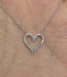 "Dainty Diamond Heart Necklace White Gold. This stylish heart necklace has a very pretty shape. The diamonds are very sparkling. Excellent craftsmanship, so lays nicely on; won't flip around. Great for layering with other necklaces also. The diamonds are clean even when viewed under a magnifying glass. The heart measures 13.5 x 13mm. The strong white gold chain included is 16\". Genuine round brilliant cut diamonds Total weight: 0.30 Carats Clarity: SI Color: G 18K White Gold pendant 14K White G Pendant Necklace Diamond, Dainty Heart Necklace, Diamond Heart Necklace, Gold Heart Pendant, Gold Link Chain, Heart Necklace Diamond, Heart Pendant Gold, White Gold Chains, Necklace Diamond