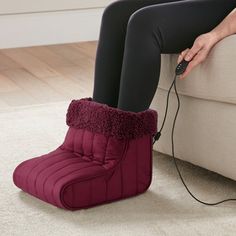 No more cold feet. This foot warmer provides luxurious warmth and comfort at home or in the office. The electric heating pad gently warms your feet while you enjoy the cozy, ultra-soft feel of the Sherpa fleece sock. Prioritizing safety and convenience, this foot warmer has an 8-foot detachable cord with a 2-hour automatic shut-off. Designed to last, this printed outer slipper retains its shape and never fades. This item is ETL-tested and certified. Micro Flannel® is a registered trademark of Sh Fleece Socks, 2024 Christmas, Heating Pad, Electric Heating, Sherpa Fleece, Wine Country, Christmas List, Bucket List, Slippers