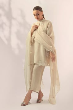 Designer Cotton Silk Cream Kurta, Cream Chanderi Kurta With Sheer Dupatta, Cotton Silk Blouse Piece With Dupatta For Eid, Designer Cream Kurta With Sheer Dupatta, Cream Raw Silk Palazzo Set With Dupatta, Silk Cream Palazzo Set For Eid, Cream Silk Palazzo Set For Eid, Off White Cotton Silk Salwar Kameez For Wedding, Off-white Cotton Silk Salwar Kameez For Wedding