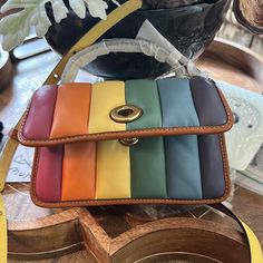 This Is An Adorable Bag. It Is About 8“ X 4.5”X3”. Roomy On The Inside And Can Accommodate An Iphone 14 S Plus With Room For Other Items. Zippered Pouch On The Inside. Shoulder Strap. Turn Lock Closure. Leather. Bag Is Sold Out. I Cannot Find The Dust Bag. Designer Multicolor Rectangular Satchel, Luxury Multicolor Bag With Adjustable Strap, Rainbow Shoulder Bag For Everyday Use, Designer Multicolor Bags For Everyday Use, Designer Multicolor Rectangular Shoulder Bag, Luxury Multicolor Satchel With Adjustable Strap, Luxury Multicolor Coach Bag, Coach Multicolor Rectangular Bag, Multicolor Rectangular Coach Shoulder Bag