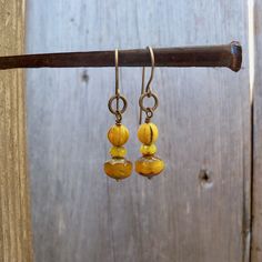 I have been seeing mustard yellow all over lately. I have had these beads tucked away, just waiting for inspiration. These earrings are dangling from pure titanium post ear wire. Perfect for those with sensitive ears. The Czech bead is a 6mm melon bead. It has a touch of black in various places on the bead. Very vintage feel to the beads. These earrings are a perfect match to the necklace that is also listed. You can find it here. https://www.etsy.com/listing/707647612/vintage-style-mustard-yell Aqua Necklace, Boho Drop Earrings, Czech Glass Jewelry, Boho Style Necklaces, Teal Earrings, Dangle Earrings Boho, Titanium Earrings, Red Bracelets, Hypoallergenic Jewelry