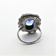 "Victorian marcasite, art glass cabochon and sterling silver statement ring, perhaps originally a mourning ring! This ring appears to be from the latter part of the 1800's and per the gemologist was typically worn with those high collared long black dresses of the period that one sees in old photos and many times as a mourning ring (also known as a memory ring). It is a large piece with the crown measuring approximately 25 mm by 19 mm. and rising a comfortable 7.5 mm from the finger to the very Victorian Engraved Rings For Memorial, Vintage Hallmarked Rings For Memorial, Victorian Engraved Memorial Rings, Antique Oval Collectible Rings, Antique Oval Engraved Ring For Collectors, Antique Signet Ring Stamped 925 For Formal Occasions, Art Nouveau Engraved Rings Collectible, Art Nouveau Engraved Collectible Rings, Antique Cabochon Sapphire Ring