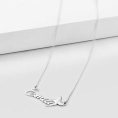 Name necklaces are a must for every fashionable woman. They have a fun and personalized feel to them. In addition, Name Necklace Official name necklaces are versatile enough for everyday wear. Slip them on alone or layer them up for a bolder look. Depending on which style you get, you can customize Name Necklace Official pieces with initials, one name, or two names. There are personalized infinity necklaces, retro nameplate necklaces, and modern bar necklaces. In addition to getting your own nam Bar Necklaces, Name Necklaces, Nameplate Necklace, Infinity Necklace, Modern Bar, Recycled Silver, Initial Pendant, Recycled Sterling Silver, Bar Necklace