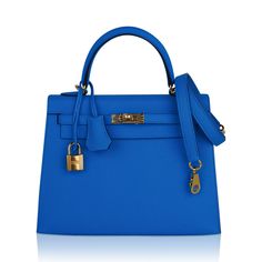 Guaranteed authentic exquisite Hermes Kelly 25 Sellier bag featured in richly saturated Bleu Frida.This exotic Hermes Kelly bag colour is a beautiful year round neutral.Accentuated with gold hardware and epsom leather. Comes with signature Hermes orange box, raincoat, shoulder strap, sleepers, lock, keys and clochette.NEW or NEVER WORN.The Hermes Kelly 25cm bag price retains its value due to the high demand of this limited style.Mightychic has offered exquisite Hermes selections for 22 years mat Hermes Crocodile Bag, Kelly 25 Sellier, College Handbags, Hermes Kelly 25, Kelly 25, Kelly Sellier, Orange Box, Hermes Orange, Hermes Kelly Bag