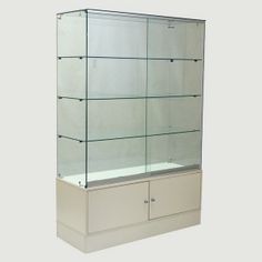 an empty display case with glass doors and drawers