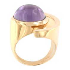 Ring in rose gold 18 Karat with Amethyst cabochon round cut (size: 14 mm). This modern ring is part of the new collection "Smooth" and takes inspiration from modern shape. The design is very accurate and unique. Our mission is to combine colorful stones and unique shape and design. Size of ring: EU 14 - USA 7 All Stanoppi Jewelry is new and has never been previously owned or worn. Each item will arrive at your door beautifully gift wrapped in Stanoppi boxes, put inside an elegant pouch or jewel Elegant Pouch, Gold Amethyst Ring, Colorful Stones, Amethyst Gold, Bracelet Design, Modern Ring, Bling Rings, Women Diamond, Ring Ring