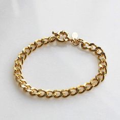 Beautiful and bold, our chunky gold chain bracelet makes a statement alone or stacked with your favorites! -Gold plated curb chain - 6mm -Chic gold plated parrot clasp Trendy Everyday Chunky Chain Bracelet, Trendy Chunky Chain Bracelet For Everyday, Trendy Chunky Cuban Link Chain Bracelet, Gold Chunky Chain Link Bracelet, Classic Cuban Link Bracelet With Chunky Chain For Everyday, Trendy Chunky Cuban Link Bracelet, Trendy Chunky Chain Cuban Link Bracelet, Chunky Chain Link Bracelets For Everyday, Everyday Chunky Chain Link Bracelet