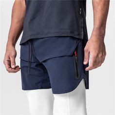 Quick-Drying Running Shorts Achieve your most ambitious goals with these Quick-Drying Running Shorts. Crafted from lightweight Polyester, they feature a classic regular fit combined with a mid-rise waist to ensure maximum comfort. The pockets embellishments add to the sporty aesthetic and make them the perfect option for casual workouts in the spring and summer. Get ready to reach your personal best in style. Functional Training Bottoms With Pockets, Fitted Training Shorts With Pockets, Casual Training Bottoms With Side Pockets, Short Length Training Bottoms With Pockets, Training Bottoms With Pockets And Short Length, Cotton Training Bottoms With Pockets, Summer Training Bottoms With Pockets, Functional Training Bottoms With Hip Pockets, Sports Bottoms With Hip Pockets And Short Length