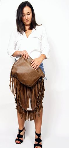 Western Fringe hobo bag - brown leather bohemian  bag, Western shoulder bag, Bohemian Women bag, Western fringe purseThis crossbody bag is the perfect size to carry your daily essentials in style! It is made from high quality leather.This leather bag is a perfect everyday bag! There is a lot of space and you can put there everything in your everyday life.* Top zipper closure* Outer slip pocket on the back* Includes internal pockets for mobile phone and other small items.Important note:The flap o Brown Satchel Bag With Fringe, Brown Rectangular Bag With Fringe, Brown Fringe Bags For Daily Use, Brown Satchel With Fringe, Brown Fringe Bag For Everyday Use, Brown Fringe Bag For Daily Use, Brown Fringe Satchel Bag, Daily-use Brown Bag With Fringe, Daily Use Brown Fringe Bag