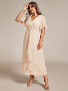 Elevate your wedding guest attire with this chic and sophisticated plus size V-neck A-line dress. The short sleeves offer comfort and style, while the ruffle hem adds a touch of feminine charm. Crafted from silver crinkle fabric, this dress shimmers elegantly under the lights, making it perfect for any special occasion. Plus Size Wedding Attire Guest, Ever Pretty, Affordable Dresses, Guest Attire, Wedding Attire Guest, Women Wedding Guest Dresses, Plus Size Wedding, Plus Size Dress, Wedding Attire