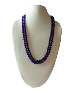 Presenting a gorgeous necklace that exudes beauty and elegance. It is perfect for occasions such as Mother's Day, Christmas, Anniversary, Birthday, and Valentine's Day. This beaded necklace is a unique addition to any fine jewelry collection and is sure to make a statement. Order now to get a one-of-a-kind piece. Note: Stone Size: 8mm Images maybe enlarged to show the details. Kindly confirm stone sizes with seller if any doubts. There can be some minor difference in stone colors due to photography lighting effects and availability. Elegant Purple Beaded Necklace With Round Beads, Elegant Purple Necklaces With Faceted Beads, Elegant Purple Necklace With Faceted Beads, Formal Purple Necklaces With Round Beads, Purple Round Bead Necklace For Formal Occasions, Purple Beaded Necklaces For Formal Occasions, Formal Purple Beaded Necklaces, Rich Purple, Fine Jewelry Collection