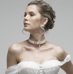 An elegant versatile Three-strand pearl choker comes with a matching pair of stud earrings. This set is a lovely addition to your modern, classic, or vintage-inspired wedding. Bridal jewelry set, Bridal choker necklace earrings, Wedding choker, white Victorian pearl jewelry set, bridesmaid jewelry, choker set, evening jewelry, party jewelry , vintage inspired jewelry • Color : White, Silver, Clear • Theme : Pearl • Necklace Size : 11" to 14" adjustable • Decor Size : 1" L • Bracelet Size : 1" H Elegant Pearl Bridal Necklace With Clavicle Chain, Elegant White Jewelry Sets For Brides, Delicate Bridal Necklace For Formal Occasion, Elegant Bridal Choker Necklace, Elegant Bridal Choker With Clavicle Chain, Elegant Pearl Choker Necklace, Delicate Clavicle Chain Bridal Necklace For Formal Occasions, Elegant Pearl White Bridal Necklace With Clavicle Chain, Elegant Pearl Choker Necklace With Clavicle Chain