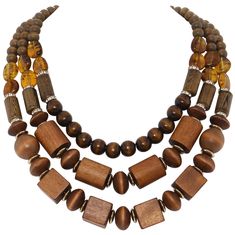 PRICES MAY VARY. Material: Wood,Acrylic,CCB,Chain. Size:necklace length 19.5"/ 21.5"/ 24.2", extension chain 2.75". Safe and Sturdy: odorless,solid wood,safe to wear,sturdy and not easy to break. Fashionable Design:The classic and simple wooden necklace is suitable for all occasions and makes you look more charming, a perfect gift for birthday, Christmas, Father's Day, Valentine's Day, anniversary, etc. More Choices: This will get you lots of compliments. We have more styles in our store, such a Brown Wood Bead Necklaces, Rustic Brown Wooden Beads Necklace, Brown Wooden Necklace With Large Beads, Chunky Black Wood Bead Necklace, Brown Multi-strand Wooden Beaded Necklaces, Beaded Collar Necklace, Wood Bead Necklace, African Necklace, Beaded Collar