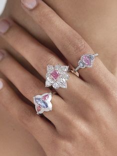 A special diamond deserves a design just as extraordinary, and this Argyle Pink™ Diamond Flora Ring by J FINE with a 1.04ct Radiant 5P SI1 Argyle Pink™ Diamond (Intense Purplish Pink on GIA report) obliges with magnificence. This unique design includes eight D color, Internally Flawless clarity Pear Shape and Round Diamonds (totaling 7.00cts) - all with GIA grading reports. It is of course handcrafted in Platinum, with all diamonds hand-set. As the Argyle Pink™ Diamond Flora Ring is handmade wit Unique Fine Jewelry, Pink Diamond Rings, Big Wedding Rings, Unique Ring Designs, Argyle Pink Diamonds, Expensive Rings, Pink Diamond Ring, Expensive Jewelry Luxury, Jewelry Accessories Ideas