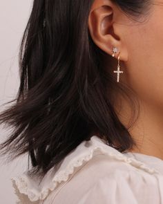 Dainty Gold / Silver Hoop Dangling CZ Pave Cross Earrings ◇ Earring measures approx.:2.7cm - total length Please note handmade earrings vary slightly ◇These earrings will arrive in an eco-friendly jewelry paper box, making it a nice gift to give a friend or keep for yourself. ◆ View more EARRINGS https://www.etsy.com/shop/eplusfjewelry?section_id=13190709 ◆ View ALL ITEMS https://www.etsy.com/shop/EFHANDMADEJEWELRY shop policies: https://www.etsy.com/your/shops/EFHANDMADEJEWELRY/policies All des Cheap Single Cross Earring, Stacking Earrings, Dangle Cross Earrings, Second Hole Earrings, Piercing Inspo, Cross Gold, Pretty Jewelry Necklaces, Stacked Earrings, Hoops Gold