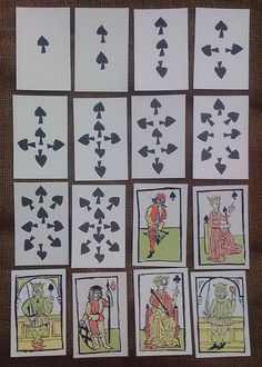 the cards have different pictures of people and arrows on them, all in black and white