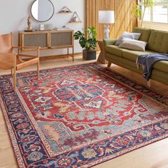 a living room filled with furniture and rugs