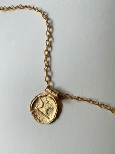 A talisman to bring you luck in your many adventures, MISHO's 22k gold plated Pisces medallion is handcrafted in sterling silver and is available with an option of 3 chains.