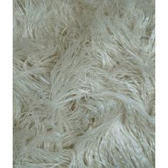 the white fur texture is very soft and fluffy, but it doesn't look like any