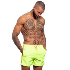 Set yourself apart from the crowd with a fun pair of swim trunks. Perfect above the knee length and comfortable fabric mean you can wear these trunks all day as you enjoy the beach, a pool party, or anywhere else you choose to enjoy them!- Matching drawstring bag included!- Convenient pockets- Elastic waistband with drawstrings- Mesh inner lining- 100% polyester- Machine washable- Made in Turkey- Model is wearing size M- Style #S-166 Green Sporty Athletic Shorts For Poolside, Yellow Summer Swim Trunks With Built-in Shorts, Yellow Swim Trunks For Summer, Yellow Swimwear With Built-in Shorts For Vacation, Summer Beach Athletic Shorts In Green, Yellow Swim Trunks For Summer Beach, Yellow Beachwear Swimwear For Water Sports, Green Athletic Shorts For Beach Sports, Green Athletic Shorts For Beach Season Sports