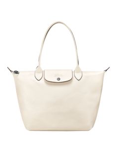 Longchamp Le Pliage Xtra Medium Leather Tote Bag White Shoulder Bag With Palladium Hardware For Travel, Silver Shoulder Bag For Everyday Luxury, Silver Bags For Everyday Luxury, Classic Cream Shoulder Bag With Palladium Hardware, White Bags With Leather Handles For Formal Occasions, Formal White Bags With Leather Handles, Classic Silver Shoulder Bag, Timeless Silver Bags With Palladium Hardware, Classic White Bag For Everyday Luxury