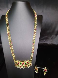 "DESIGN 1 : Sitpushpa Tanmani with beautiful multicolour motimala 30 inch. Its Micro gold polished with setting stone Premium quality DESIGN 2: \"Suryashobha Tanmani\" necklace with beautiful extension of mohanmala. It's micropolished with setting stone. Length is 30 inch DESIGN 3 . multicolor pink pearl necklace with tanmani" Multicolor Temple Necklace For Rituals, Multicolor Kundan Temple Necklace, Festive Multicolor Kundan Necklace With Latkans, Temple Jewelry Multi-stone Necklace For Festivals, Festival Multi-stone Temple Necklace, Festive Multi-stone Temple Necklace, Festive Multicolor Spiritual Temple Necklace, Festive Spiritual Multicolor Temple Necklace, Multicolor Tilla Temple Necklace For Navratri