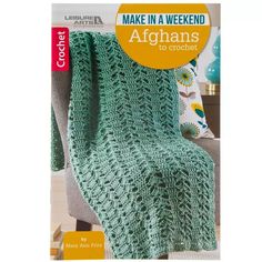 the cover of make in a weekend afghans to crochet