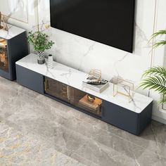 a living room with marble flooring and white walls, including a tv mounted on the wall