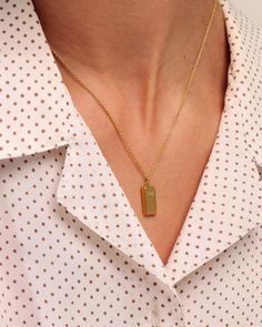 Our gold bar necklace comes in a polished design at 2.3mm thick, with new engraving options on all sides of the pendant. Available in 925 sterling silver, 18k yellow gold plated, 14k solid yellow gold, and 14k solid white gold. BARLength: 15mmThickness: 2.3mmWidth: 7.5 mm(can engrave on the side as well) Gold Bar Necklace, Gold Bar, Travel Pouch, Bar Necklace, Solid Yellow, 18k Rose Gold, Rose Gold Plates, On The Side, Types Of Metal