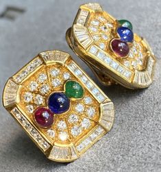 Adler 18K Yellow Gold Sapphire Ruby Emerald Cabochon Diamond Clip-On Earrings | eBay Luxury Multicolor Earrings For Evening, Formal Multicolor Earrings, Designer Yellow Gold Cabochon Jewelry, Luxury Multicolor Earrings For Formal Occasion, Luxury Cabochon Earrings For Evening, Exquisite Emerald Jewelry With Cabochon, Luxury Cluster Emerald Jewelry, Luxury Formal Clip-on Earrings With Cabochon, Luxury Multi-stone Earrings For Formal Occasions