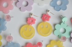 Smiley acrylic dangle earring   This earring is lightweight and dainty!  - Earring posts are hypoallergenic. - Earring is made with acrylic components and a hypoallergenic post. ᕱ Find more great Fern & Arrow Workshop goods at https://fern-arrow-workshop.square.site/ Trendy Plastic Earrings For Gift, Trendy Hypoallergenic Resin Earrings, Trendy Yellow Plastic Earrings, Trendy Hypoallergenic Clear Earrings, Trendy Resin Earrings, Key Fobs Wristlet, Wet Bag, Wristlet Keychain, Earring Posts