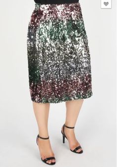 Dress it up or dress it down, either way this midi length sequin skirt is sure to make a splash. Available in sizes 1X, 2X, 3X only. Skirt colors are Gold - Pink - Green. Multicolor Sequin Skirt For Party Season, Multicolor Sequin Skirt For Party, Multicolor Sequined Party Skirt, Sequin Skirt For Night Out In Fall, Fall Sequin Skirt For Night Out, Fall Party Midi-length Skirt, Fall Party Midi-length Bottoms, Summer Midi Skirt With Sequins, Fall Party Midi Skirt