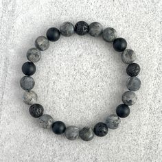 Men's beaded bracelet includes: ~ 8mm or 10mm Matte Black Labradorite beads ~ 8mm or 10mm Matte Onyx beads ~ 8mm or 10mm Black Lava beads ~ Stretchy cord; simply slide bracelet on and off wrist ~ Comes packaged in a re-usable microfiber pouch To ensure the perfect fit, please use the bracelet sizing instructions found in the photo gallery. Boy Bracelets, Bracelets For Guys, Male Bracelets, Bracelet Boys, Bracelet Boy, Boys Bracelet, Bracelet For Boys, Beads Bracelet For Men, Beaded Bracelets For Men