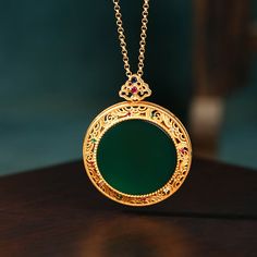 This Clouds Jade Plate Pendant Necklace is made with exquisite craftsmanship for a delicate and elegant look. It is crafted with one-of-a-kind natural jade stones to ensure long-lasting wear and unique beauty. This special necklace makes a perfect gift for any special occasion.

Natural emerald Jade stone
Chain length: 45 CM (+ 5 cm adjustable chain)
24K gold
Pendant size: 34*42mm
Adjustable lobster clasp size - one size fits all
Hypoallergenic, lead and nickel free

If you aren't in LOVE with y Special Necklace, Natural Gemstone Jewelry, Green Gifts, Unique Beauty, Natural Jade, Jade Stone, Copper Pendants, Custom Bracelets, Natural Emerald