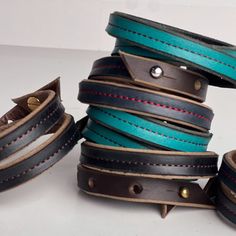 The Leather Wrap bracelets have been a top seller from the beginning. Choose from our everyday leather handbag leathers stitched to the top of our latigo wrap bracelets. Wear alone or layer them for the perfect arm party---these pieces are sure to be a favorite! Layer them all! -Bracelet wraps twice around wrist -3 adjustable sizes Leather Bracelets For Everyday Use, Leather Bracelet With Black Band For Everyday, Everyday Leather Bracelets With Black Band, Handmade Leather Bracelets For Everyday, Leather Bracelet With Wrist Strap For Everyday Use, Handmade Leather Bracelet For Everyday, Leather Bracelets With Wrist Strap As Fashion Accessory, Leather Double Band Bracelet With Leather Strap, Everyday Handmade Leather Bracelets