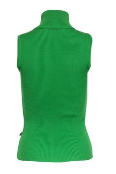 Get the best of both worlds with this two-toned Dolce & Gabbana turtleneck! This sleeveless sweater features a deep, lush purple on the front and surprises you with a bold and vivid green hue on the back. The sleeveless design makes this the perfect layering piece for the fall. Pop this on with a blazer for the office or switch it up to something a little more casual by wearing a denim jacket. However you choose to rock this piece, you will be turning heads! Size 4 (IT 40) 60% Merino Wool, 40% A Fitted Sleeveless Knit Top For Layering, Fitted Sleeveless Knit Top With Ribbed Neckline, Knit Turtleneck Tank Top, Fitted Sleeveless Casual Sweater, Trendy Fitted Crew Neck Vest, Trendy Fitted Green Vest, Fitted Knit Turtleneck Sweater Vest, Green Ribbed High Neck Top, Winter Ribbed Vest