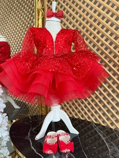 Red Long Sleeve Sequined Baby Girl Dress, Puffy Toddler Christmas Dress, Baby Tulle Christmas Dress, Girls Holiday Tutu Dress This red puffy dress is specially designed and handmade for your baby girl. Your girl will be like a princess with these dresses that she can wear on special occasions such as birthdays, weddings and christmas. This dress, which will create your girl's style with a clasp and shoes, is ideal for special occasions. Check out our baby girl dresses selection for unique handmade dresses from AymiraDesign. ✿ Product Features; ✰ Baby Dress Materials: Sequined Tulle ✰ Baby Dress Color: Red ✰ Set Content: Dress, Clasp, Shoes ✰ Size Options: * 0-3 months, 3-6 months, 6-9 months, 9-12 months, 12-18 months, 18-24 months, 2T, 3T, 4T, 5, 6 US kids' numeric ✰ Note: Shoes are US ch Holiday Tulle Dress With Ruffles, Fitted Tulle Princess Dress For Christmas, Fitted Tulle Holiday Dress, Holiday Princess Dress In Tulle, Holiday Tulle Princess Dress, Elegant Holiday Princess Dress In Tulle, Elegant Tulle Princess Dress For Holiday, Christmas Tulle Holiday Dress With Ruffles, Holiday Tulle Dress