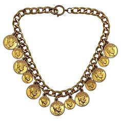 MOSCHINO vintage gold tone chain necklace featuring FRANCO MOSCHINO coin charms. Spring clasp closure. Embossed MOSCHINO. Indicative measurement : length approx. 45.5 cm (17.91 inches) / chain width approx. 1 cm (0.39 inch) / largest coin diameter approx. 2.3 cm (0.91 inch). Material : Gold tone metal hardware. NOTES - This is a preloved vintage item, therefore it might have imperfections. - Colors may differ slightly from actual product appearance due to differences in lighting conditions. - As a buyer, you are fully responsible for customs duties, other local taxes and any administrative procedures related to imports into the country of destination. Luxury Vintage Charm Round Necklaces, Moschino Vintage, Franco Moschino, Sapphire Solitaire, Jeremy Scott, Solitaire Pendant, John Galliano, Vintage Jewels, Gianni Versace