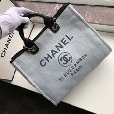 Description CC Deauville Tote 38cm White Gray For Women A66941 Rep 1:1 Size: 38 x 30 x 18 cm Dusty white gray Shouder bag Handbag Canvas Bag Large compartment Include dust bag. This product is of the best quality. Stylish Handbags, Luxury Products, Chanel Bags, Evening Clutch Bag, Tote Backpack, Cute Bag, Large Bags, Satchel Bags, Canvas Bag