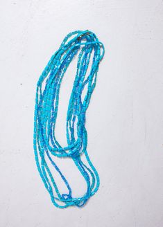 "Vintage 1960s fantastic costume necklace. 4 strands of multi colored blue plastic beaded extra long strands. Looks great doubled over of worn long. Gold tone clasp closure. Marked: none Measures 50\" total Condition: Excellent. Please do not hesitate to convo with any questions. We upload large pictures - Simply click on each picture for a closer look. More VINTAGE from DEJAVINTAGE here... http://www.etsy.com/shop/dejavintageboutique - Follow us on Instagram @dejavintage for exclusive first loo Blue Double Strand Beaded Necklaces With Colorful Beads, Blue Double Strand Beaded Necklace With Colorful Beads, Blue Double Strand Beaded Necklace For Beach, Blue Double Strand Necklace With Colorful Beads, Blue Double Strand Beaded Necklace, Blue Long Necklace With Colorful Round Beads, Vintage Double Strand Colorful Beads Necklace, Blue Long Necklace With Colorful Beads, Bohemian Blue Long Necklace With Faceted Beads