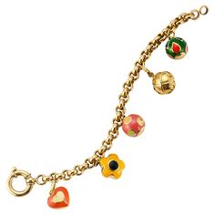 Gold and Enamel Charm Bracelet Yellow gold bracelet with 5 round enameled gold charms Length: 7.5" Metal Type: 18k gold Weight: 29g Gold Armband, Gold Charms, Yellow Gold Bracelet, Enamel Charms, Gold Enamel, Gold Charm, Charm Bracelets, Types Of Metal, Metallica