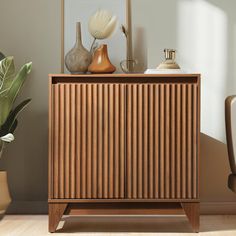 Get all your household clutter out-of-sight and organized with the help of this beautiful 2-door accent cabinet measuring 30.7W*15.6D*32.5H. We love the unique waveform fluted panel detailing that makes this versatile piece fit with a vintage design aesthetic and stand out in any home decor. It is crafted from heavy-duty engineered wood with a smooth natural walnut brown finish. The specious top table and 2 soft-close cabinet doors add visual texture and provide great storage ability, the solid Modern Farmhouse Buffet, Fluted Panel, Farmhouse Buffet, Accent Storage Cabinet, Door Accent Cabinet, Dining Room Sideboard, Tv Storage, Cabinet Modern, Accent Storage