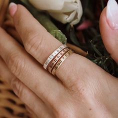 Mother's Day Gift | Personalized stackable ring set, engraved with a name, date, or special word.  Metal: 14k gold filled, .999 fine silver, 14k rose gold filled Dimensions: 2mm tall on average, but our rings are handmade so variations will occur.  Font: lowercase typewriter Unsure what size you need? We highly recommend using our ring sizer for an accurate fit. Some people find that sizing up when stacking 3 or more rings is more comfortable. https://www.etsy.com/listing/239177790/adjustable-ri Stackable Mothers Rings Names, Dainty Personalized Stackable Rings For Mother's Day, Adjustable Stackable Rings With Custom Name For Mother's Day, Personalized Silver Stackable Rings For Mother's Day, Customizable Stackable Rings For Mother’s Day, Personalized Stackable Rings, Stackable Name Rings, Stackable Ring Sets, Mixed Metal Rings