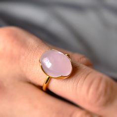 D E T A I L S - Material: 925 Sterling silver Stone: Pink Chalcedony Stone Shape: Oval Stone Size: 10x14mm The fit: True to US ring size Finish: Gold Plated to a high shine S H I P P I N G & P R O D U C T I O N - My current production time is 2-6 business days, which means after those days are up, your order ships! I make everything custom to order, by hand, but I promise you it's worth the wait! R U S H - M Y - O R D E R - If you're in a rush to get your pretty new pieces, please send me a Faceted Stackable Rings Fine Jewelry Gift, Faceted Stackable Rings As Fine Jewelry Gift, Faceted Stackable Rings For Gifts, Polished Finish Rings For Gift, Faceted White Gold Rings As Gift, Faceted White Gold Ring Perfect As A Gift, Faceted White Gold Ring Gift, Fine Jewelry Oval Stackable Rings As Gift, Faceted White Gold Rings For Gift