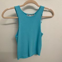 Nwt Zara Basic Knit Tank Top In Blue Usa Size: Small Eur Size: Small Chic Stretch Blue Knit Top, Light Blue Stretch Tops With Solid Color, Chic Blue Ribbed Top, Trendy Solid Color Blue Tops, Trendy Blue Solid Color Tops, Blue Ribbed Tank Top For Summer, Light Blue Ribbed Summer Top, Casual Blue Stretch Crop Top, Trendy Blue Fitted Knit Top